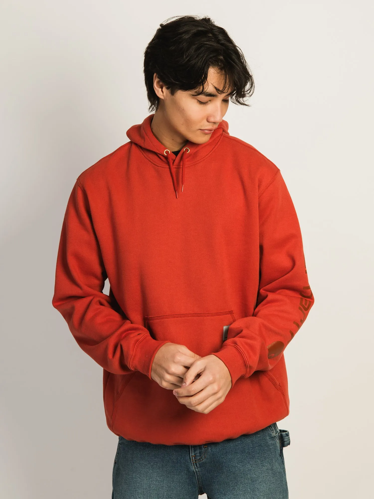 CARHARTT LOGO SLEEVE GRAPHIC PULL OVER HOODIE - SADDLE RED